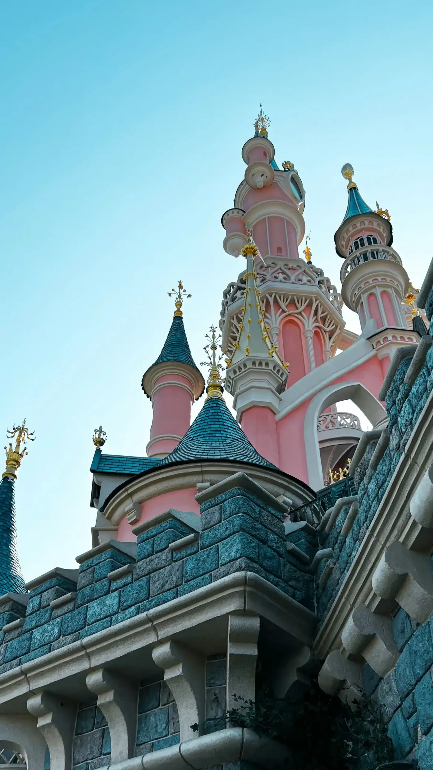 A wide-angle shot of the sleeping beauty castle in Disneyland Paris.