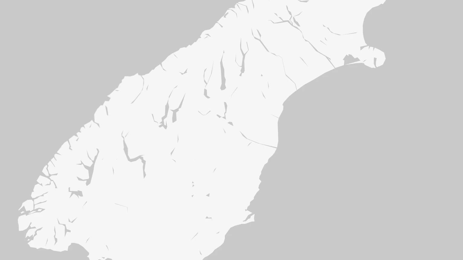 A gray map of New Zealand\'s South Island.