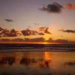 Sonnenuntergang am Strand in Neuseeland